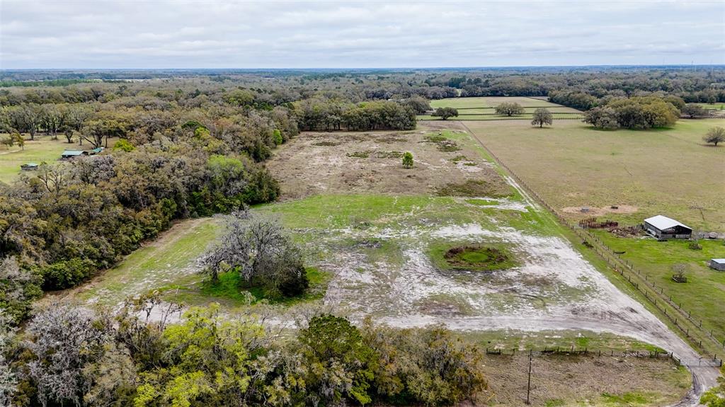 Northeast 160th Avenue Williston, FL 32696 - Photo 4 of 44 a view of a lake with beach and outdoor space