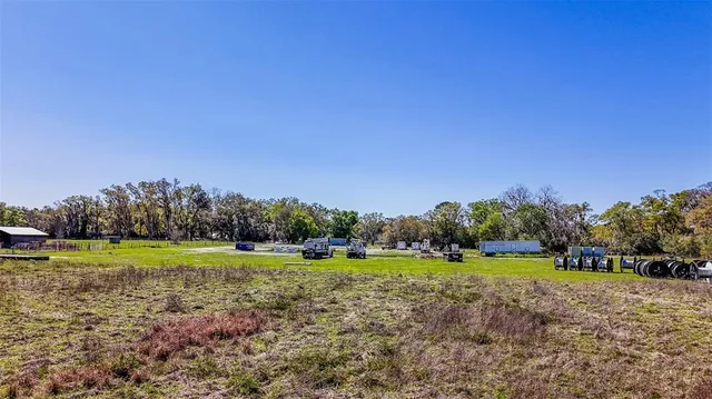 a view of a golf course with a yard