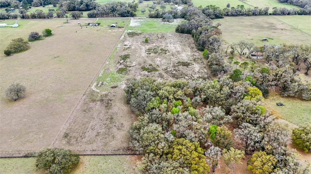 Northeast 160th Avenue Williston, FL 32696 - Photo 10 of 44 a view of a lake with beach and outdoor space