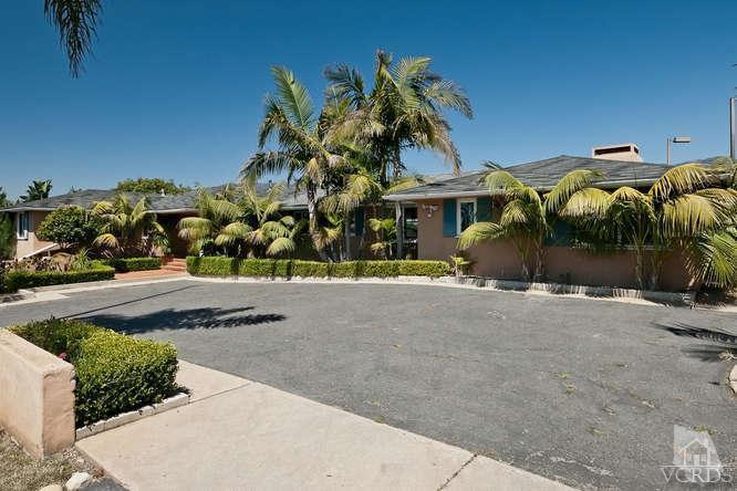 front view of a house with a street