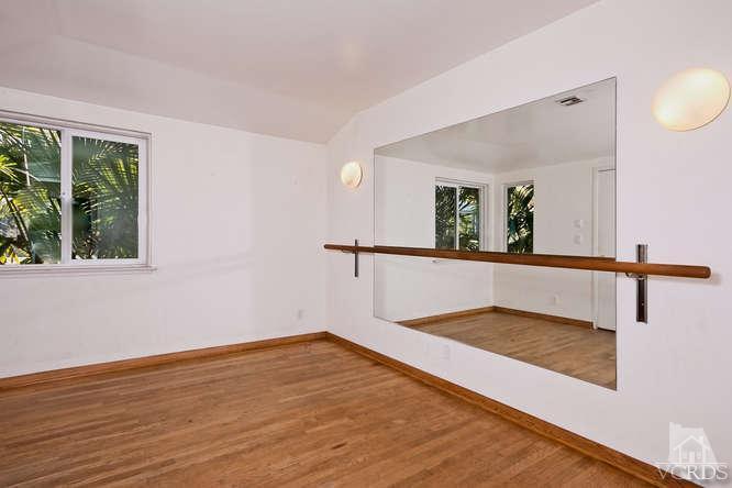 1240 Mark Avenue Carpinteria, CA 93013 - Photo 9 of 20 a view of a room with wooden floor and potted plant