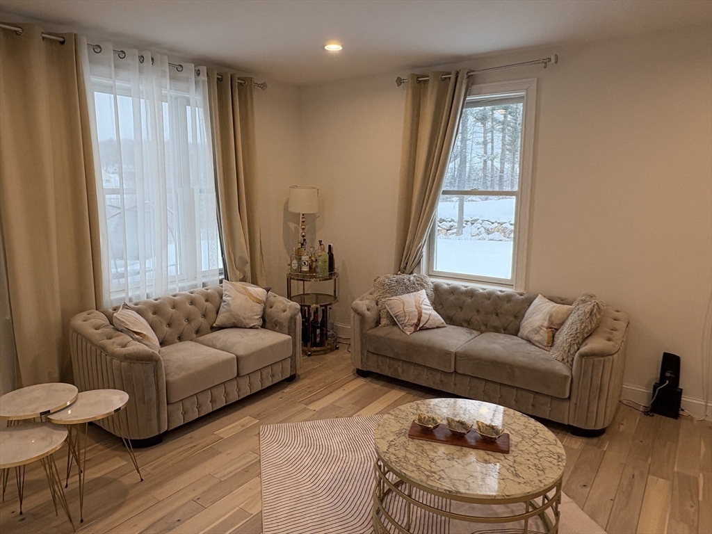 5 Barnard Hill Road Boylston, MA 01505 - Photo 18 of 37 a living room with furniture and a window