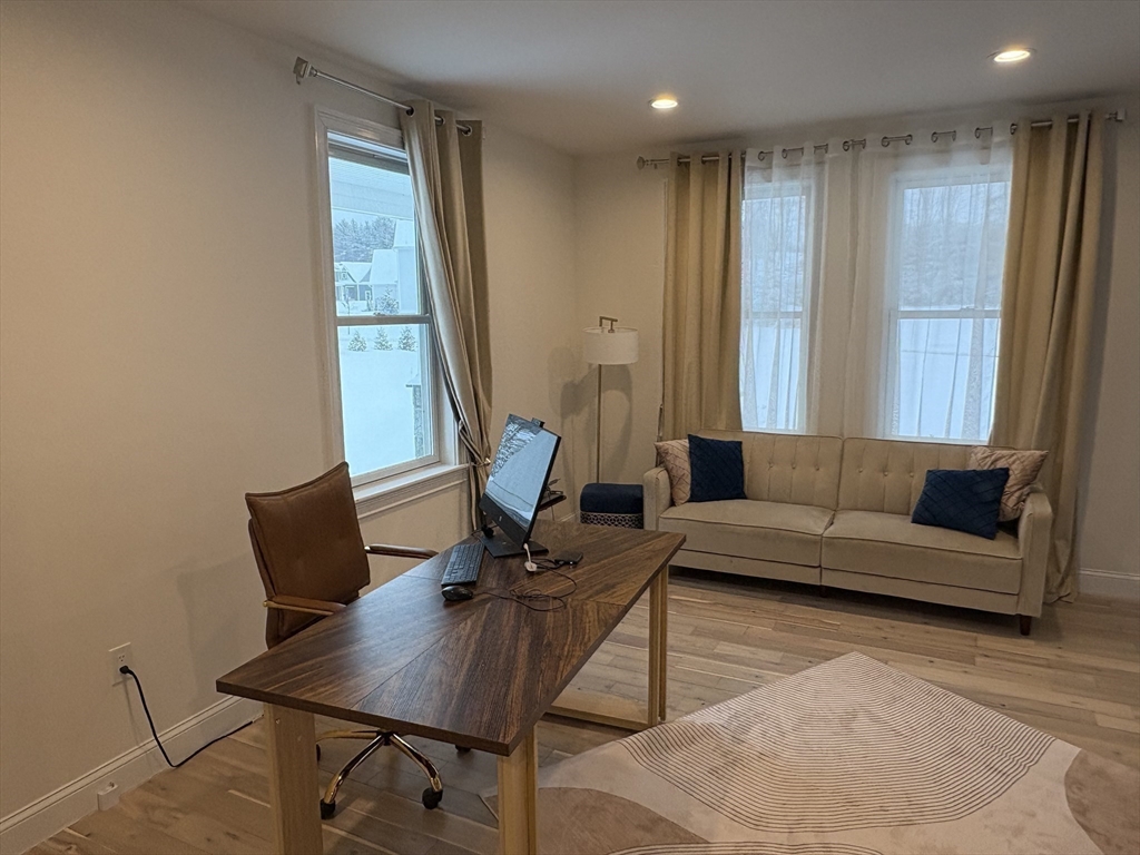 5 Barnard Hill Road Boylston, MA 01505 - Photo 19 of 37 a living room with furniture and a large window