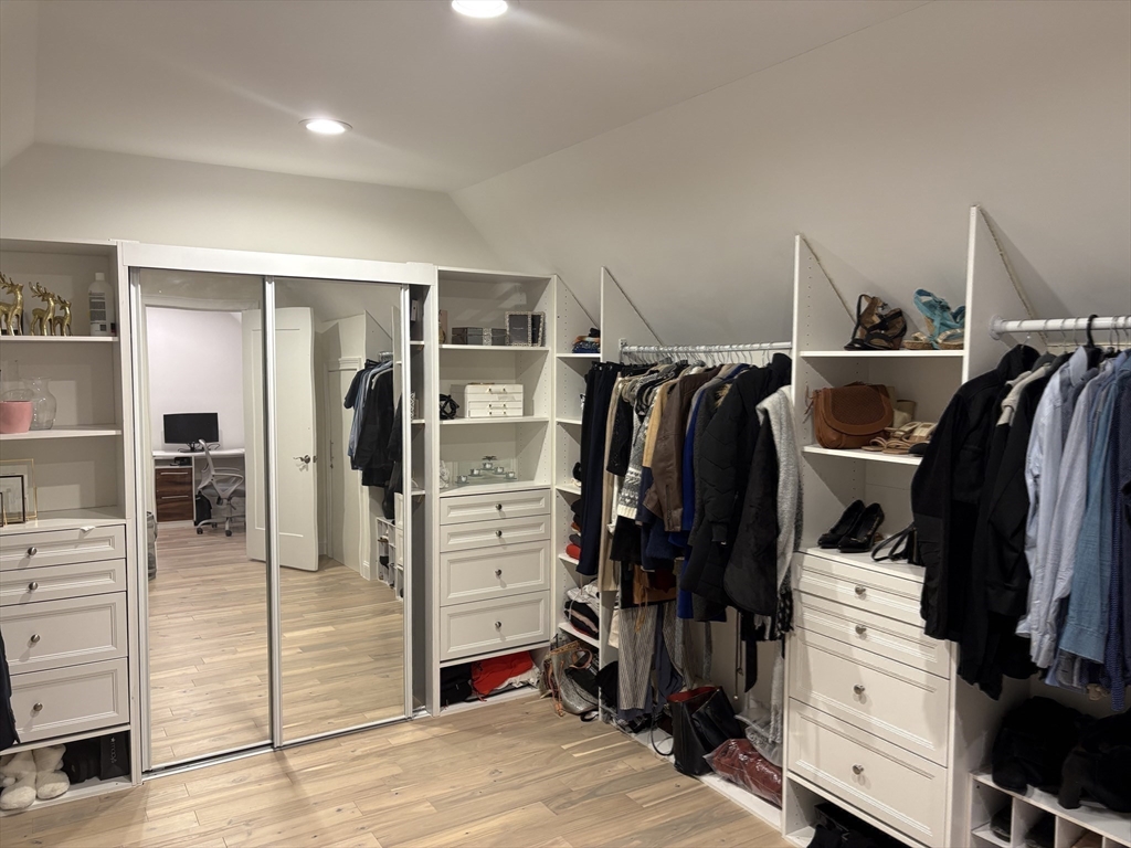 5 Barnard Hill Road Boylston, MA 01505 - Photo 29 of 37 a view of walk in closet with clothes and shoes