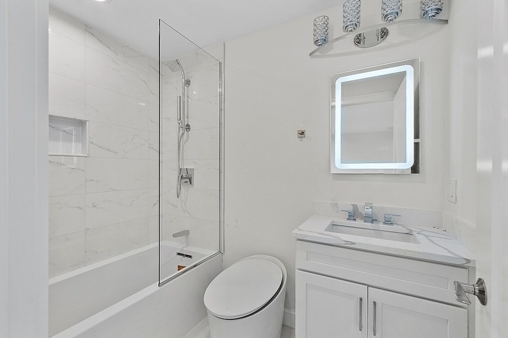 5 Barnard Hill Road Boylston, MA 01505 - Photo 34 of 37 a bathroom with a granite countertop sink a toilet and shower
