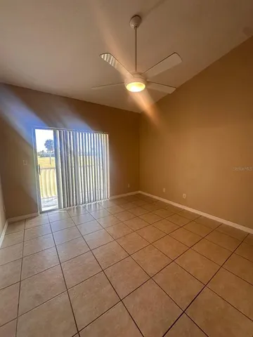 a bathroom with a glass door shower and a sink