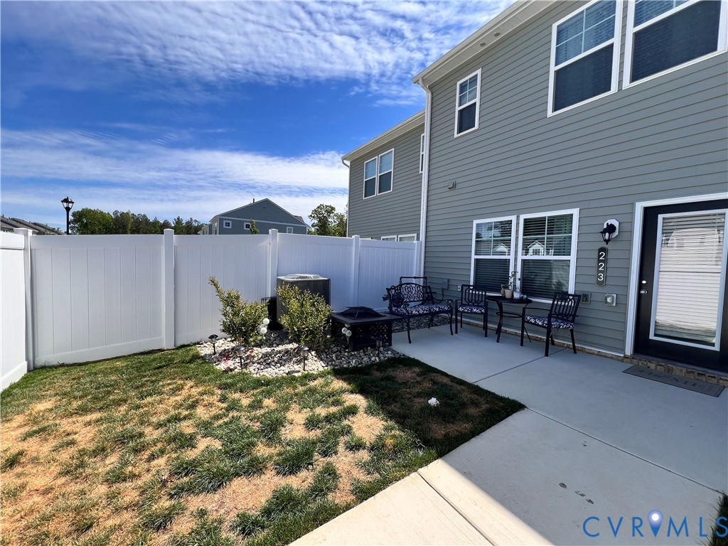 223 Whiteside Road Sandston, VA 23150 - Photo 21 of 22 Private fenced backyard with a concrete patio, ext