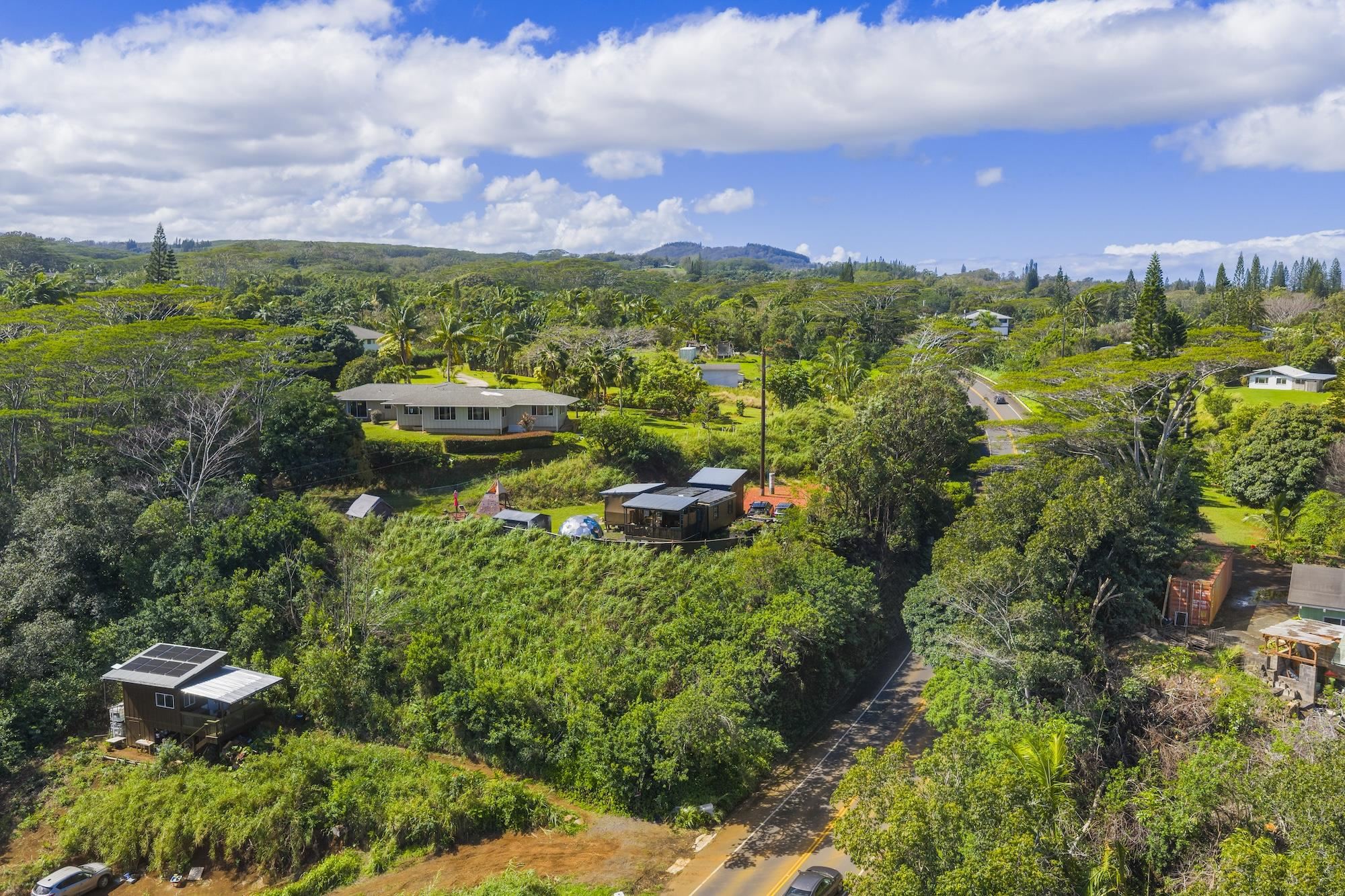 3980 Hana Highway Haiku, HI 96708 - Photo 1 of 33 a view of a lake with a houses