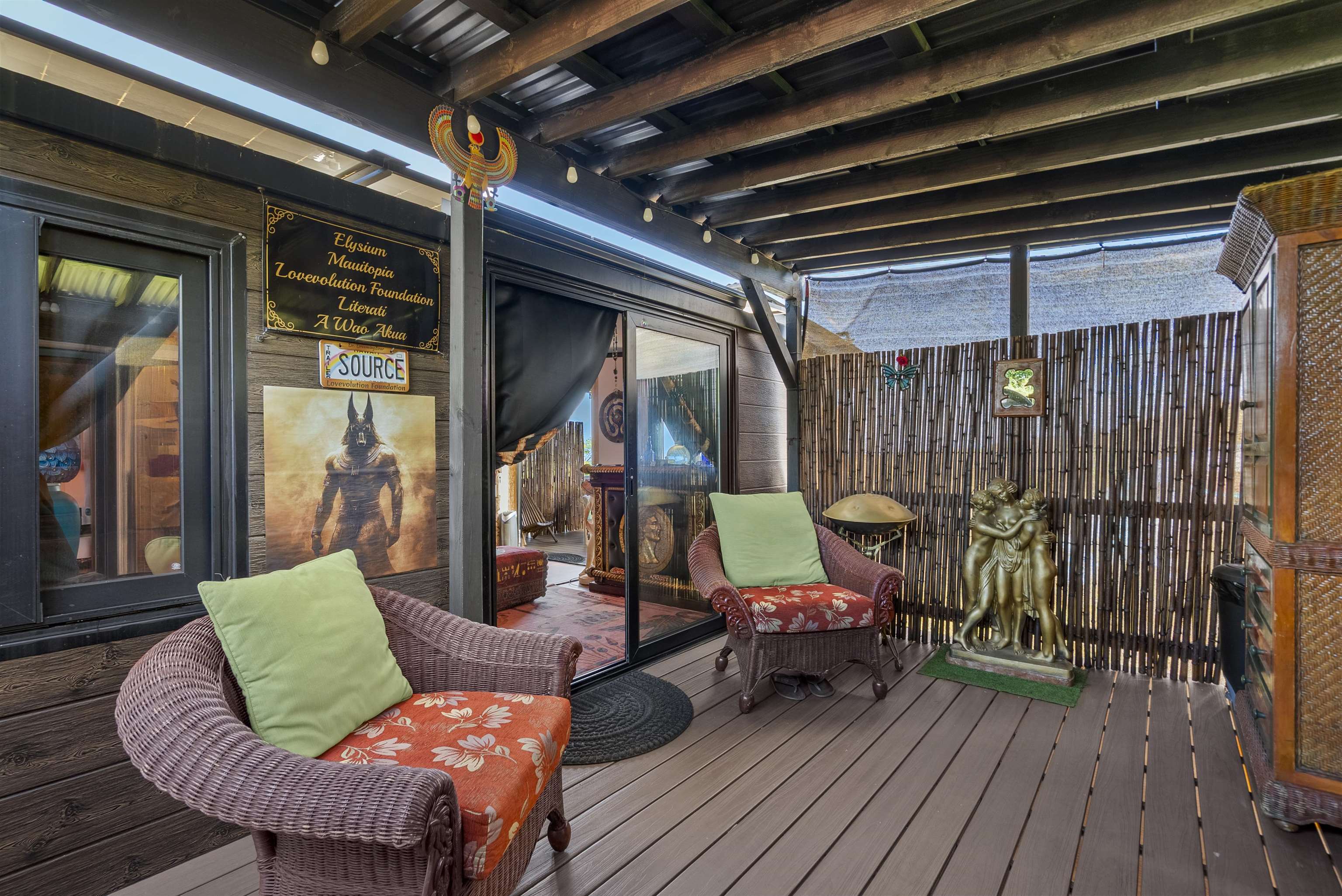 3980 Hana Highway Haiku, HI 96708 - Photo 16 of 33 a view of a porch with furniture and a patio