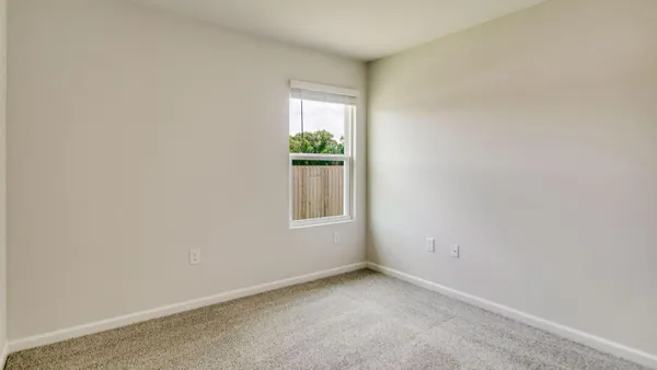 a view of a window in an empty room