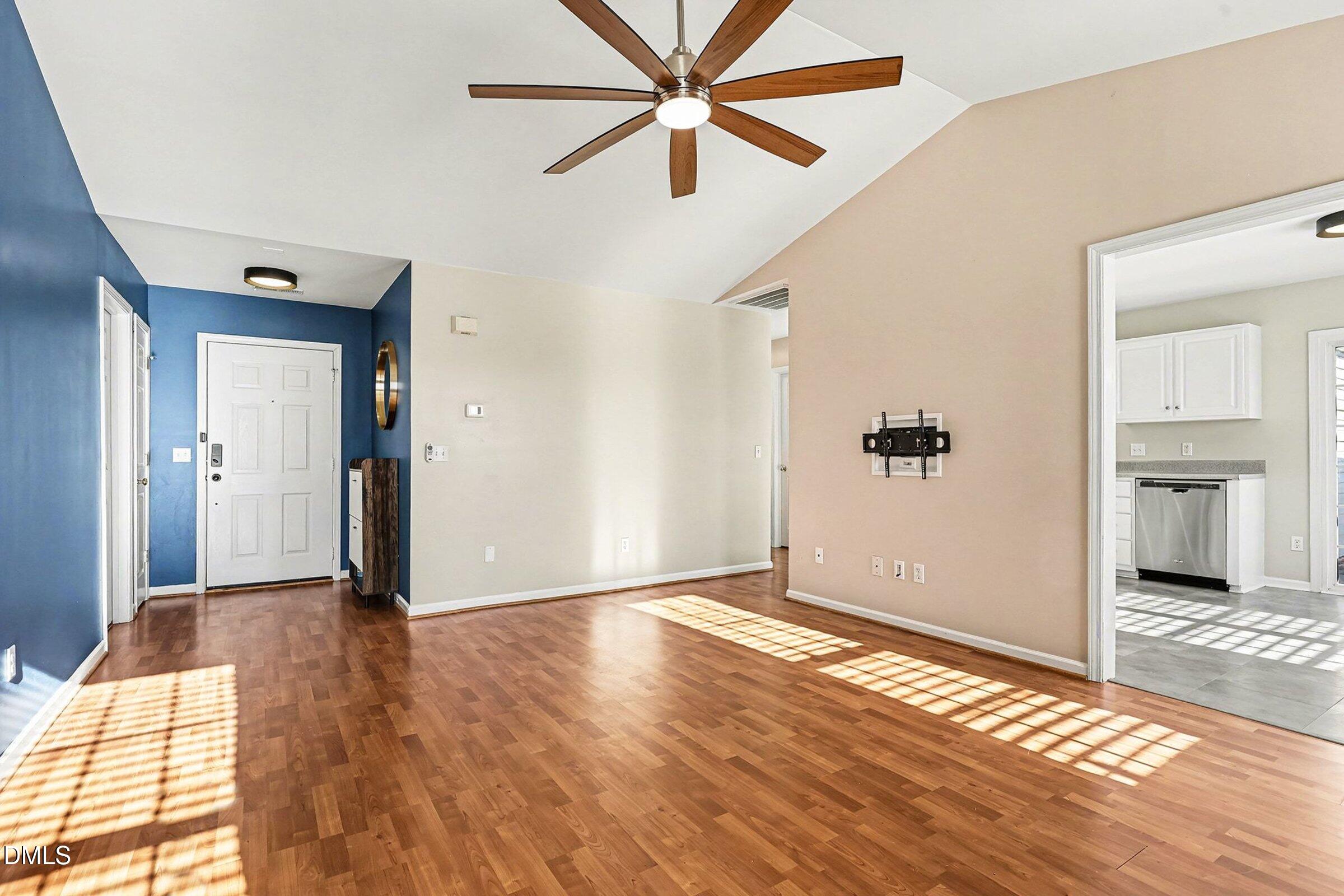 1005 Tesh Court High Point, NC 27265 - Photo 10 of 34 wooden floor in an empty room with a window