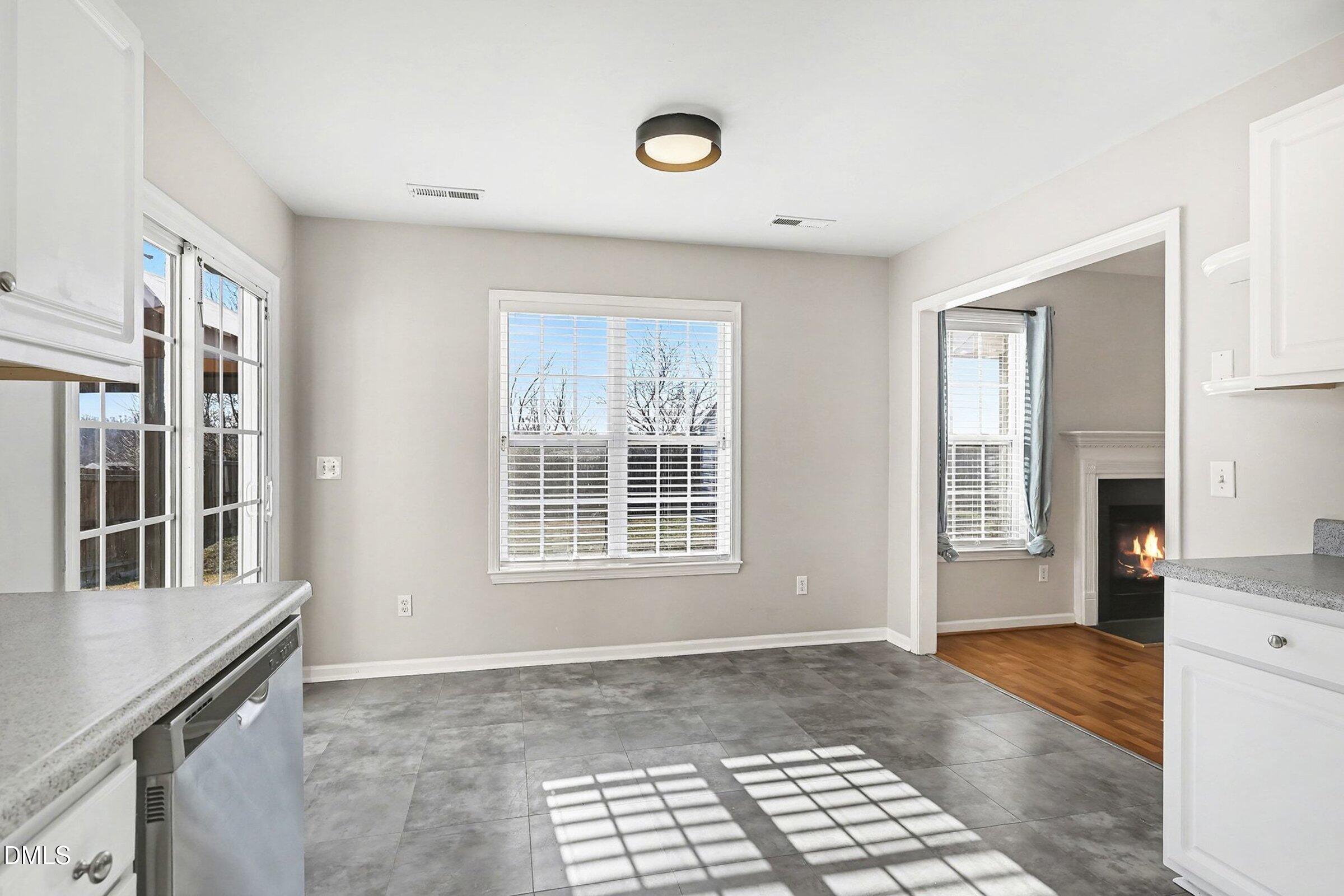 1005 Tesh Court High Point, NC 27265 - Photo 12 of 34 a view of an empty room with window and hardwood floor