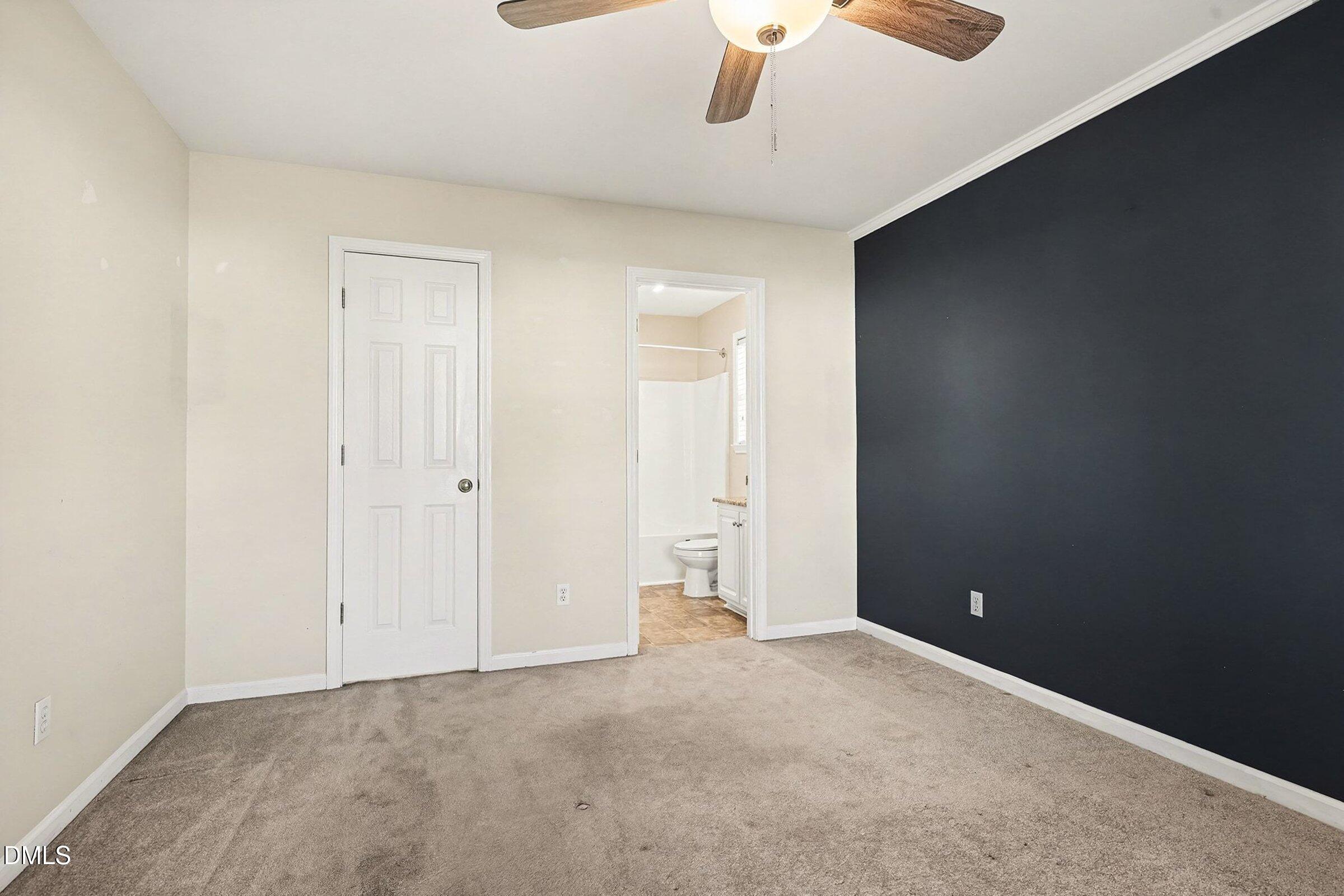 1005 Tesh Court High Point, NC 27265 - Photo 17 of 34 an empty room with chandelier fan