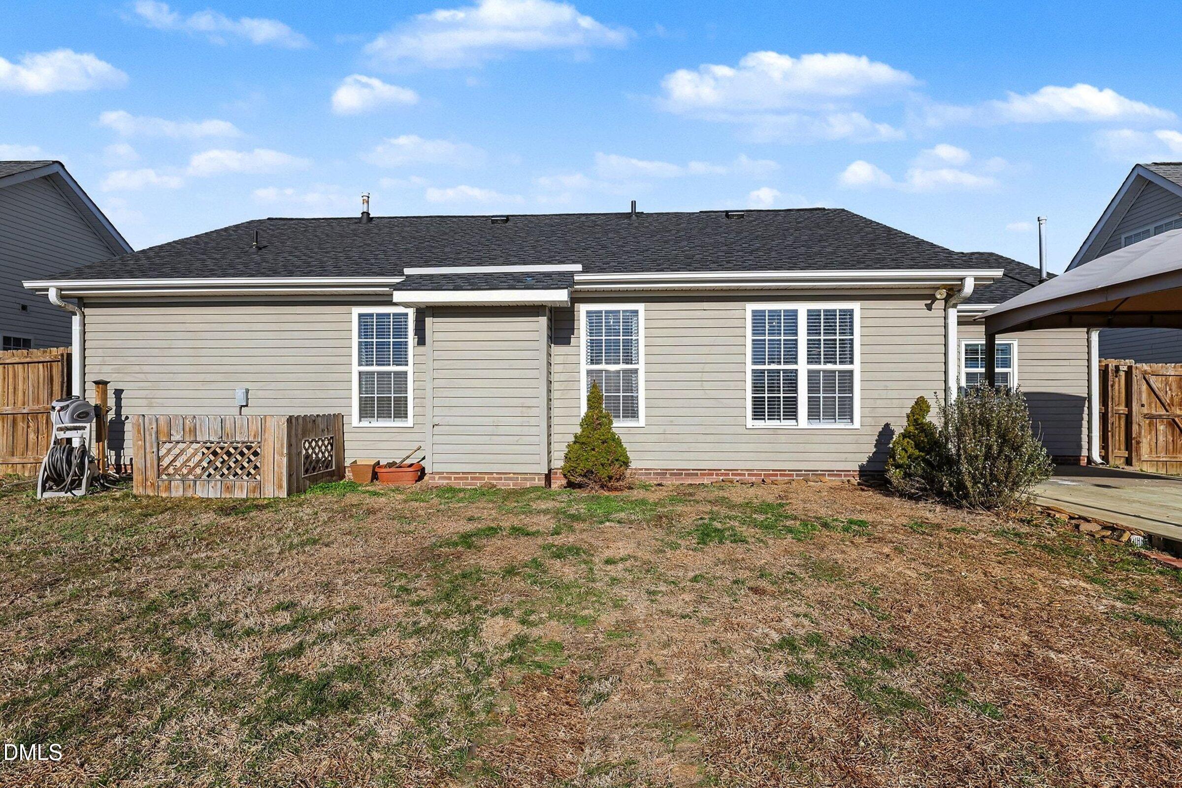 1005 Tesh Court High Point, NC 27265 - Photo 27 of 34 a view of a house with backyard and a tree