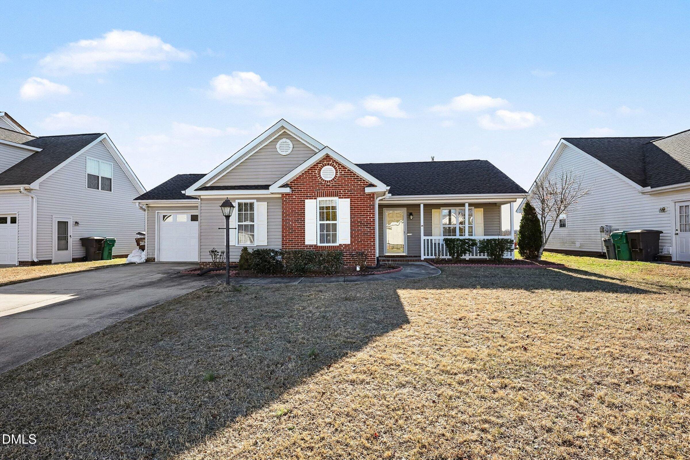 1005 Tesh Court High Point, NC 27265 - Photo 32 of 34 a front view of a house with a yard