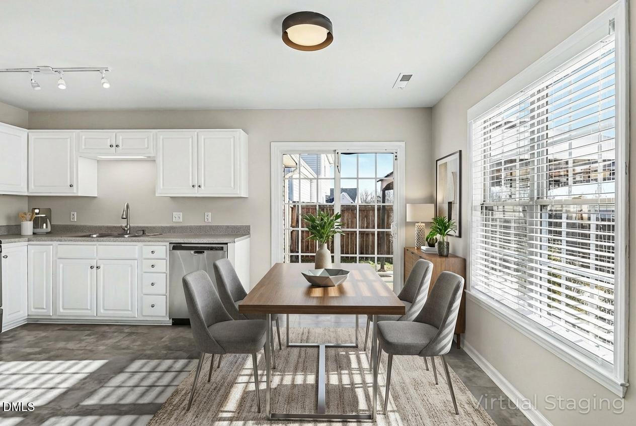 1005 Tesh Court High Point, NC 27265 - Photo 5 of 34 a view of a dining room with furniture and wooden floor