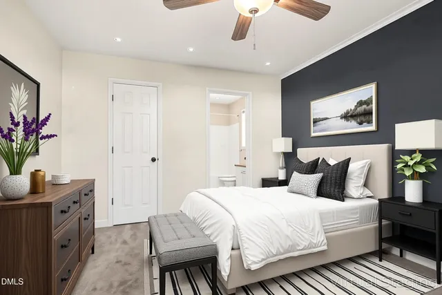 a bedroom with a bed and a dresser