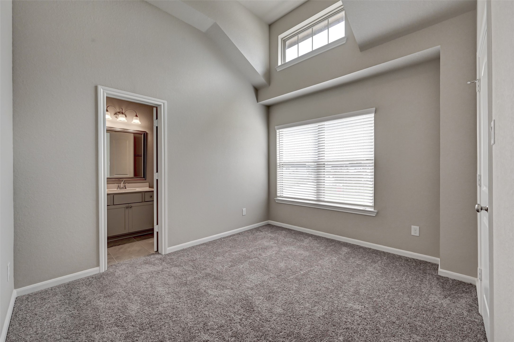 5039 Prairie Terrace Lane Fulshear, TX 77441 - Photo 12 of 16 Secondary bedroom with high ceiling and lots of natural light.