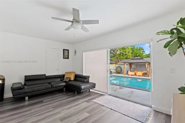 a living room with furniture and a gate