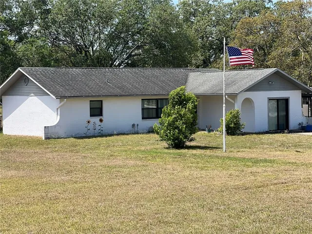 a house view with a garden space