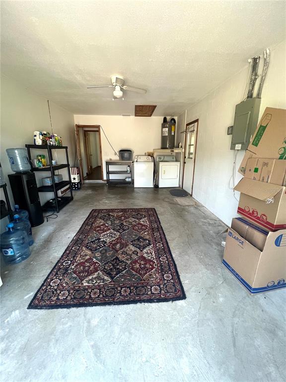 13020 Sun Road Brooksville, FL 34613 - Photo 25 of 33 a living room with furniture and a couch