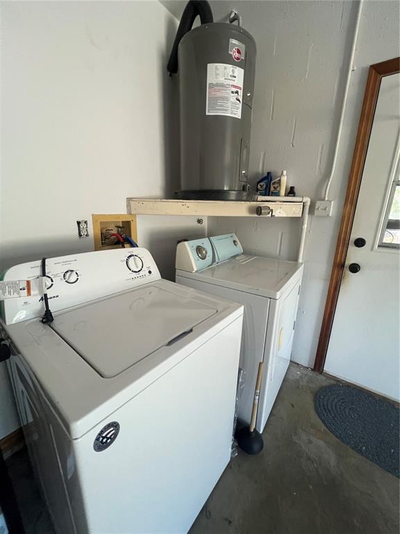 13020 Sun Road Brooksville, FL 34613 - Photo 27 of 33 a utility room with dryer and washer