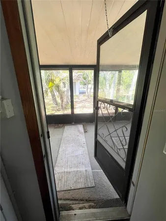 a view of a house with a tree