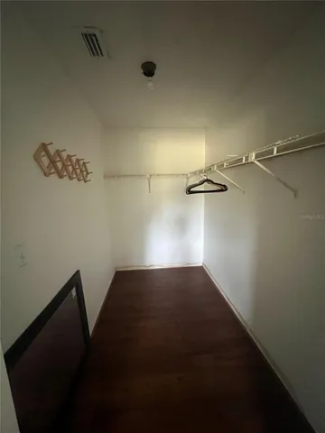 a view of a room with racks on the wall