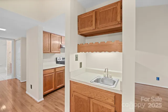 a bathroom with a sink a mirror and shower
