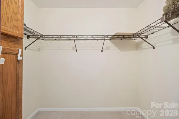 a view of a room with racks on the wall