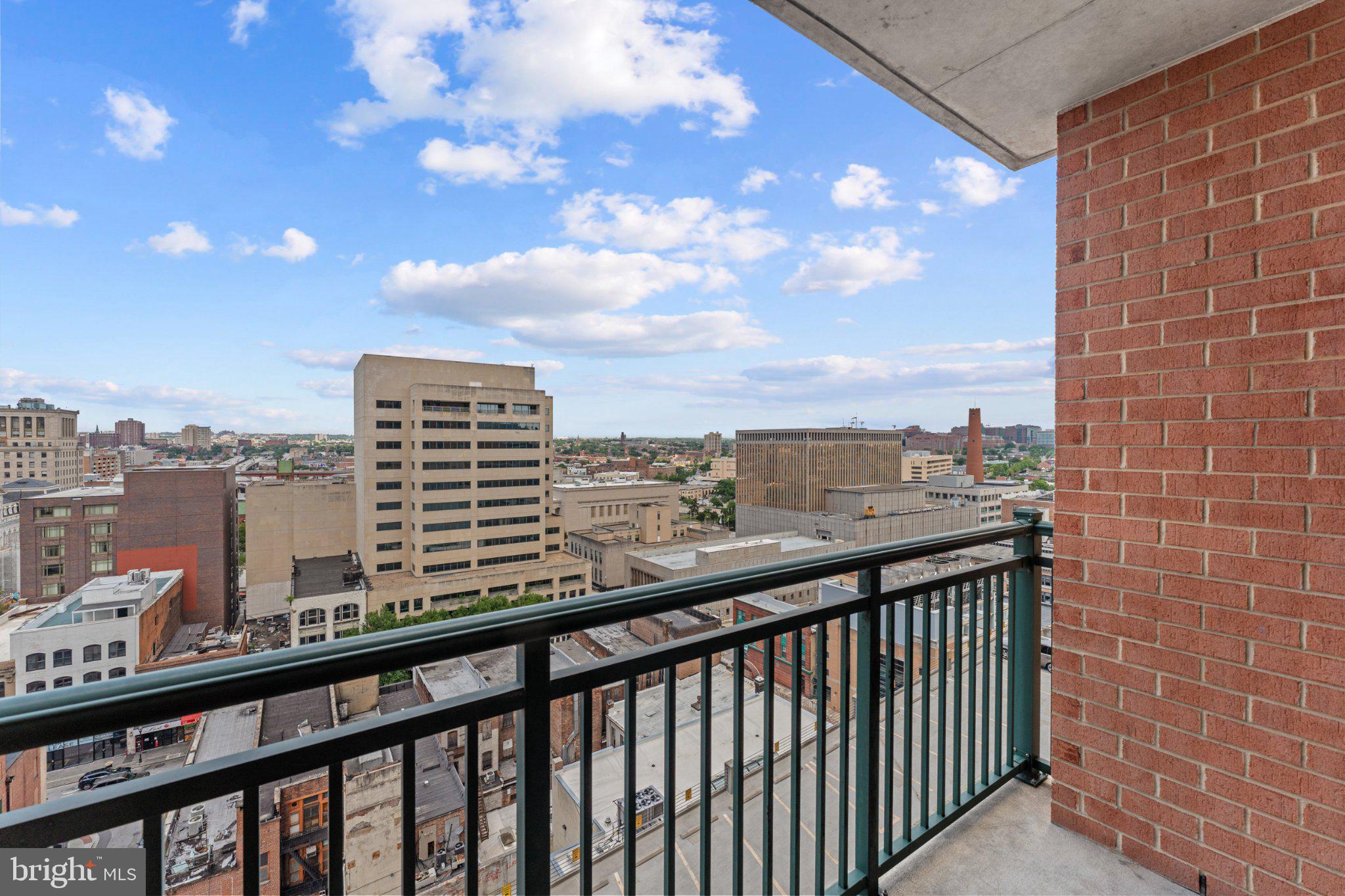 414 Water Street, Unit 1306 Baltimore, MD 21202 - Photo 15 of 29 Urban skyline from a stylish balcony.