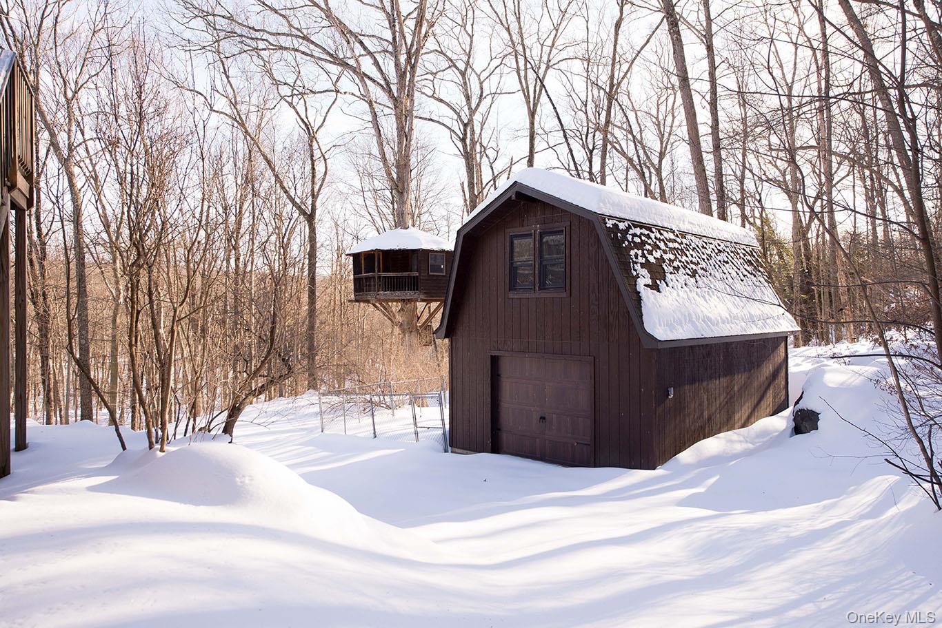 1644 Lakes Road Monroe, NY 10950 - Photo 47 of 49 a view of a house with a snow in the background