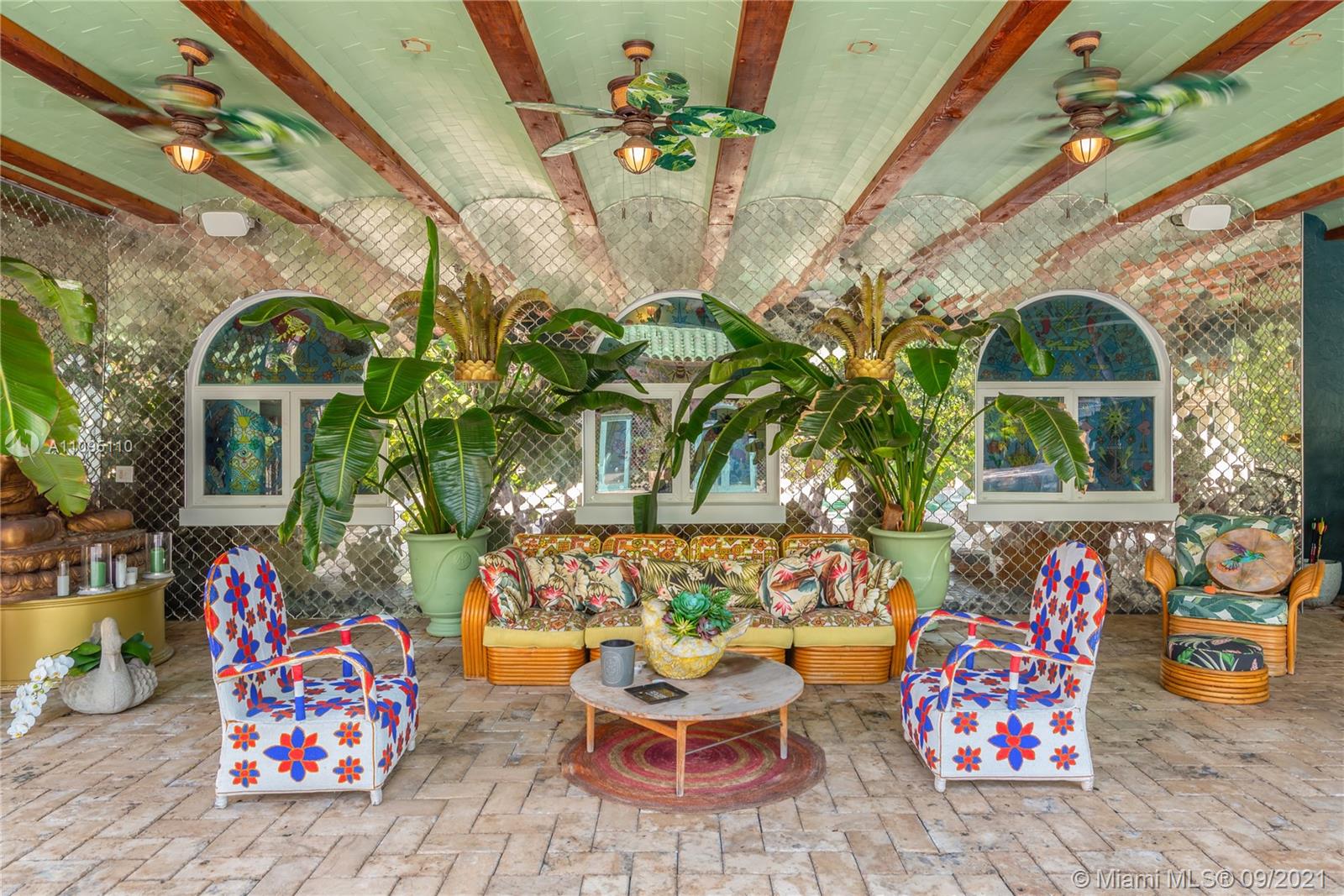 5454 Pine Tree Drive Miami Beach, FL 33140 - Photo 18 of 33 a outdoor living space with furniture