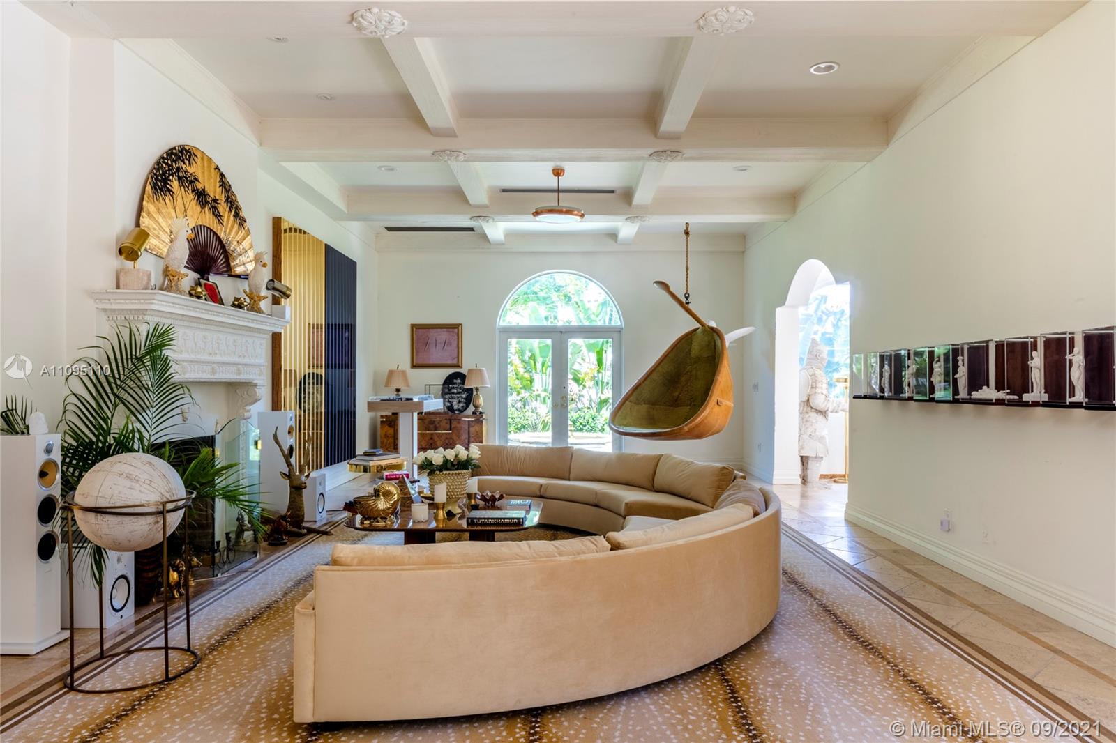 5454 Pine Tree Drive Miami Beach, FL 33140 - Photo 3 of 33 a living room with furniture and a large window