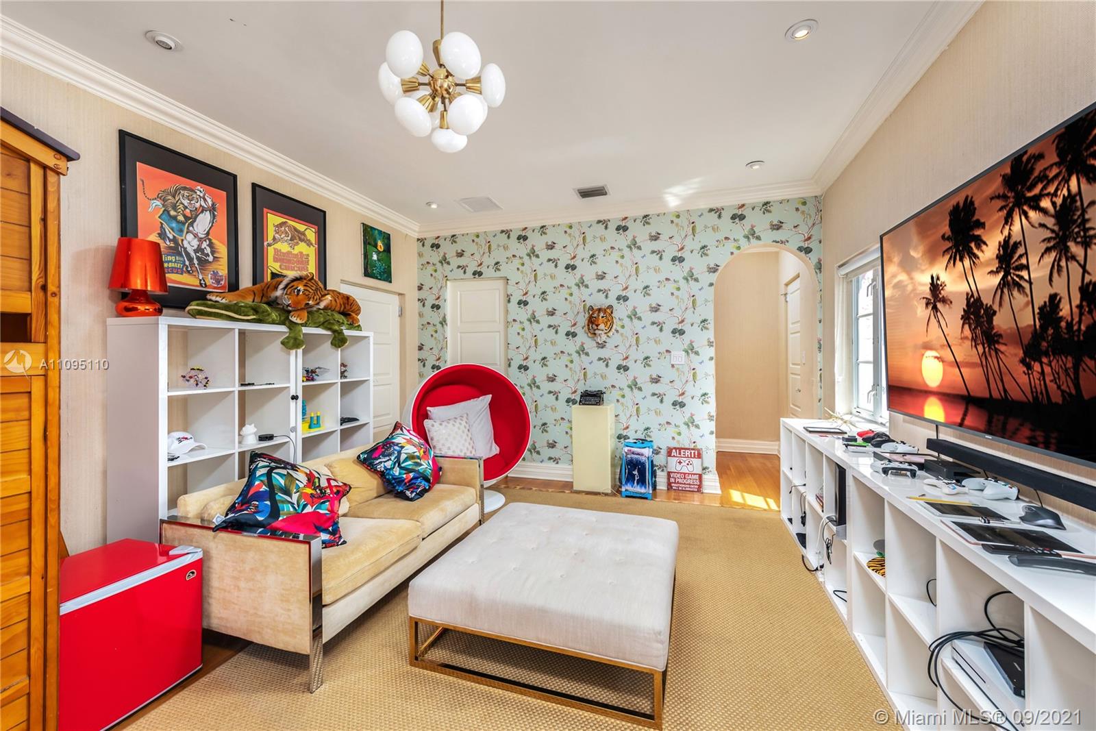 5454 Pine Tree Drive Miami Beach, FL 33140 - Photo 24 of 33 a bedroom with furniture and window