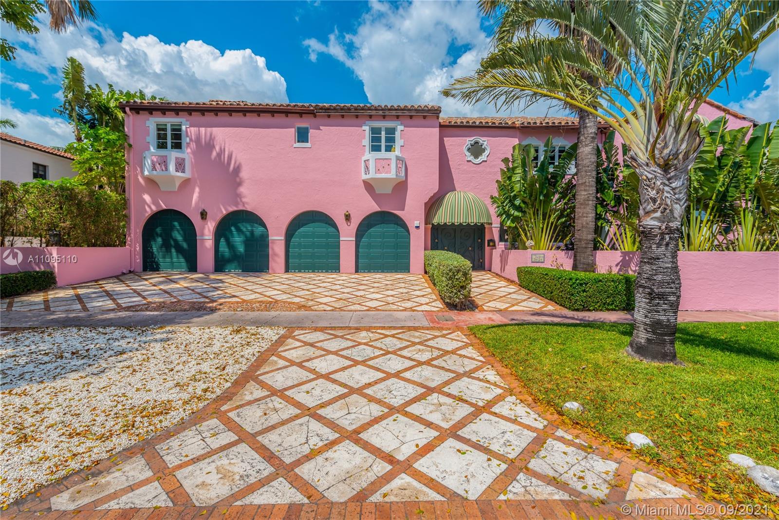 5454 Pine Tree Drive Miami Beach, FL 33140 - Photo 27 of 33 a view of a street with potted plants