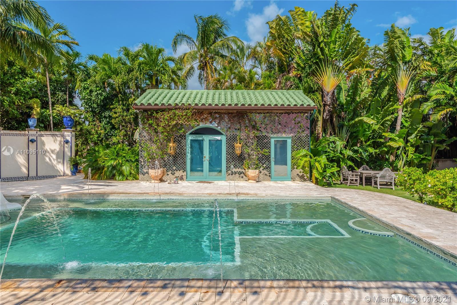 5454 Pine Tree Drive Miami Beach, FL 33140 - Photo 30 of 33 a view of a house with a yard