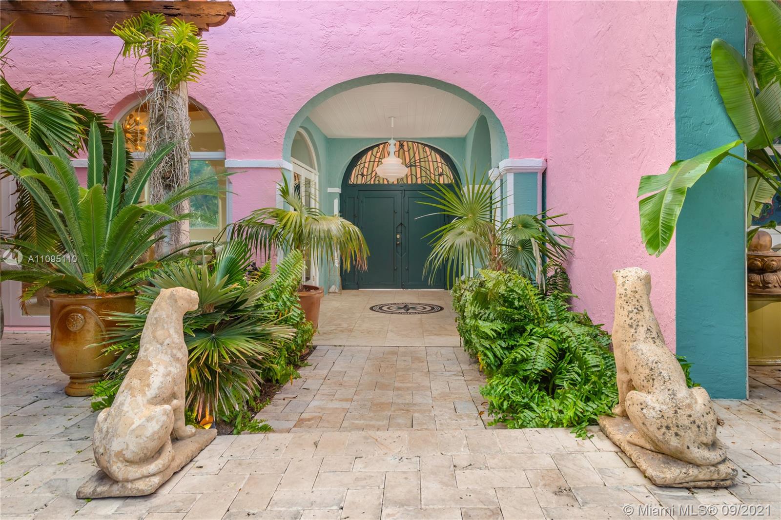 5454 Pine Tree Drive Miami Beach, FL 33140 - Photo 31 of 33 a view of entryway with garden