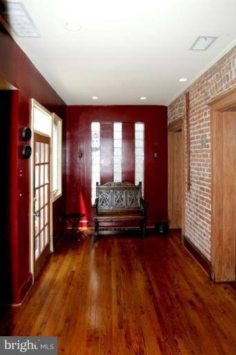 2946 Upton Street Northwest Washington, DC 20008 - Photo 7 of 22 a view of a room with wooden floor and windows