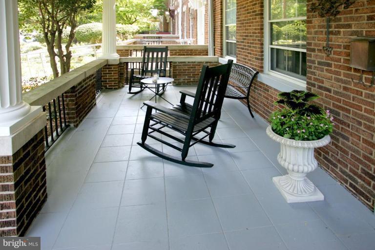 2946 Upton Street Northwest Washington, DC 20008 - Photo 9 of 22 a view of a chairs and table in the balcony