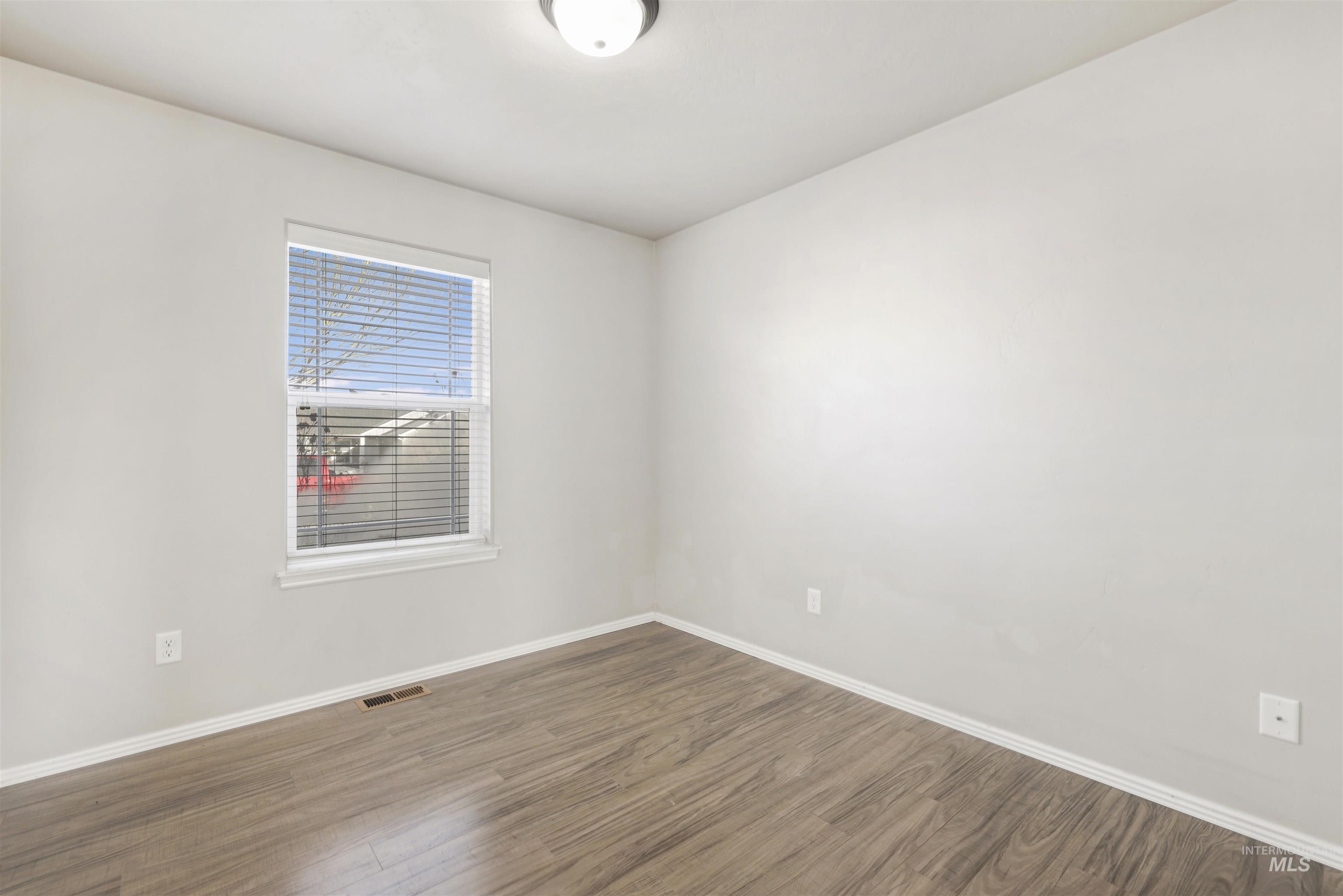 370 Feather Avenue Twin Falls, ID 83301 - Photo 16 of 17 Spare room with wood finished floors