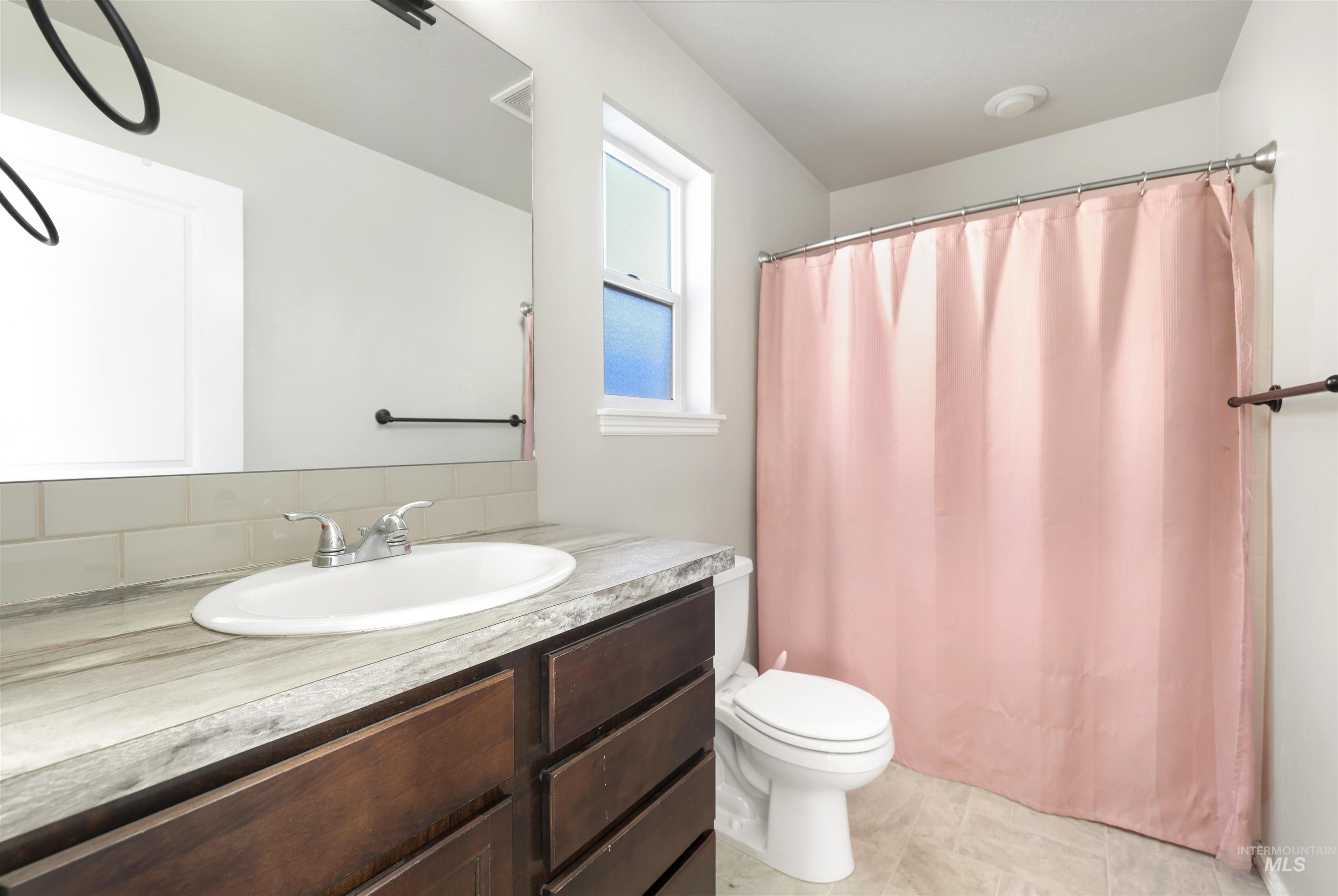 370 Feather Avenue Twin Falls, ID 83301 - Photo 9 of 17 Full bath with vanity and toilet