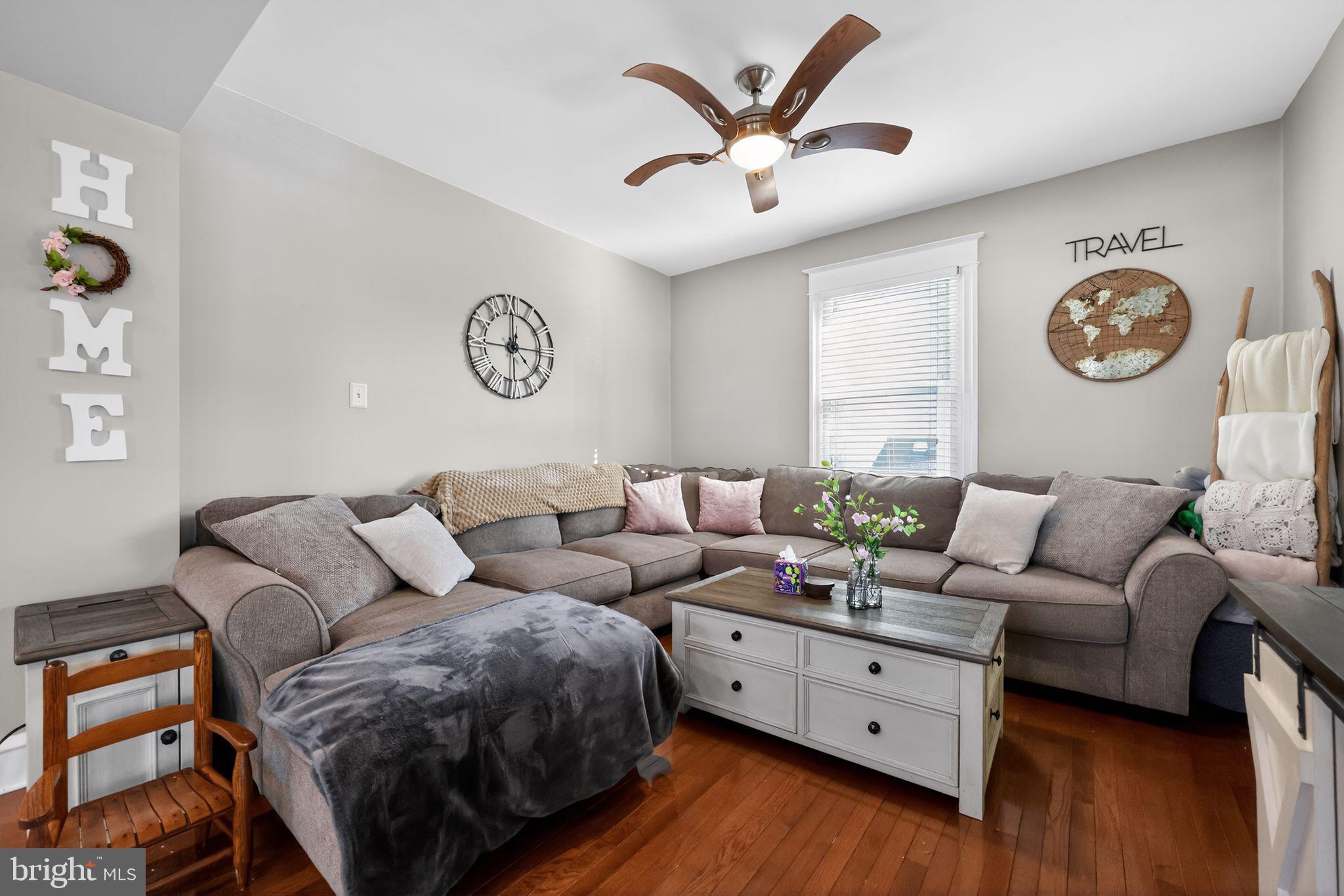 801 Chandler Street Philadelphia, PA 19111 - Photo 9 of 30 a living room with furniture and a large window