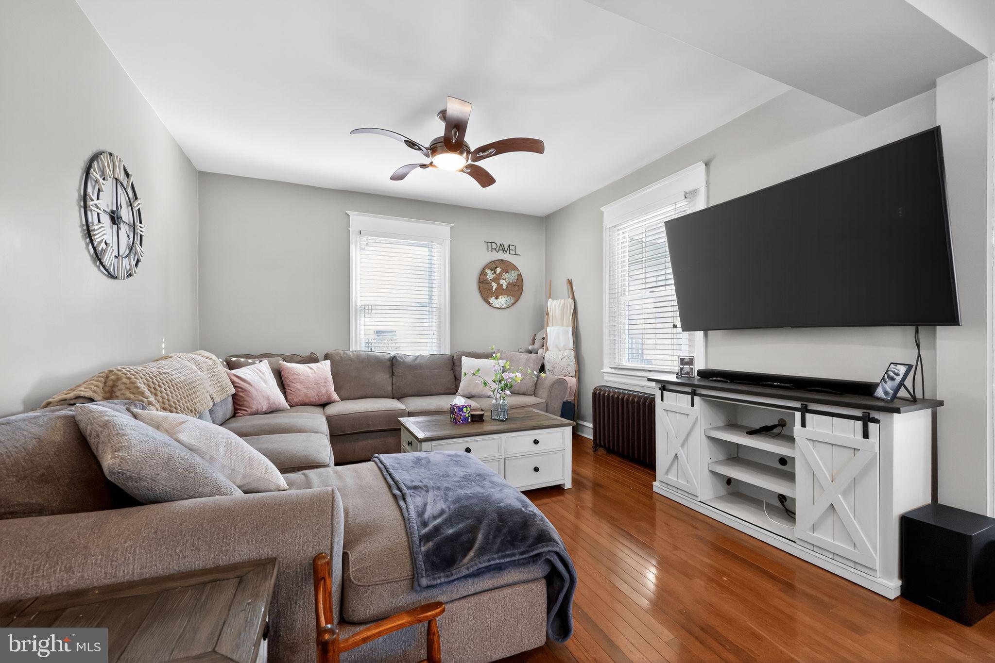 801 Chandler Street Philadelphia, PA 19111 - Photo 10 of 30 a living room with furniture and a flat screen tv
