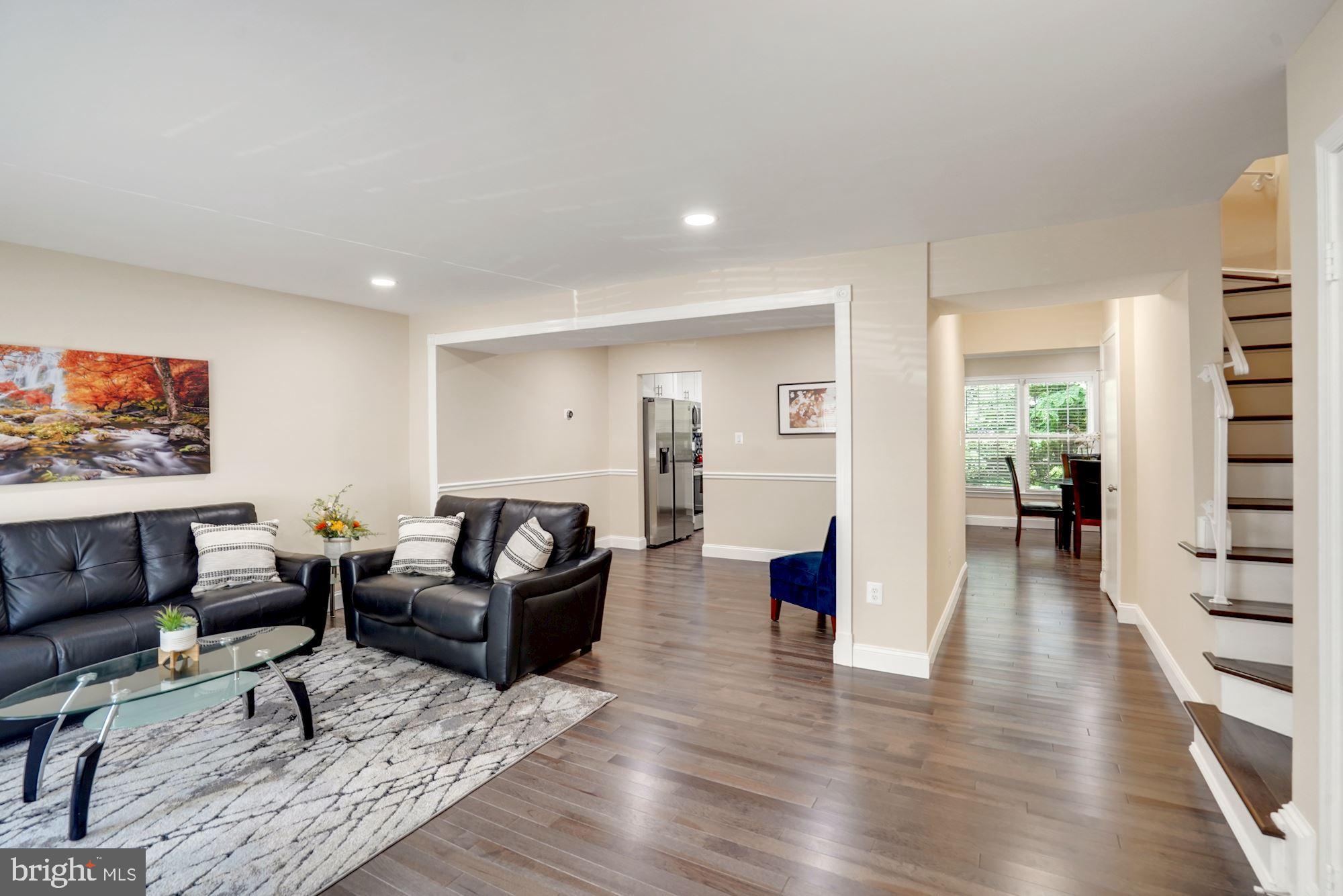 8014 Sleepy View Lane Springfield, VA 22153 - Photo 2 of 35 Open concept with gleaming solid hickory floors.
