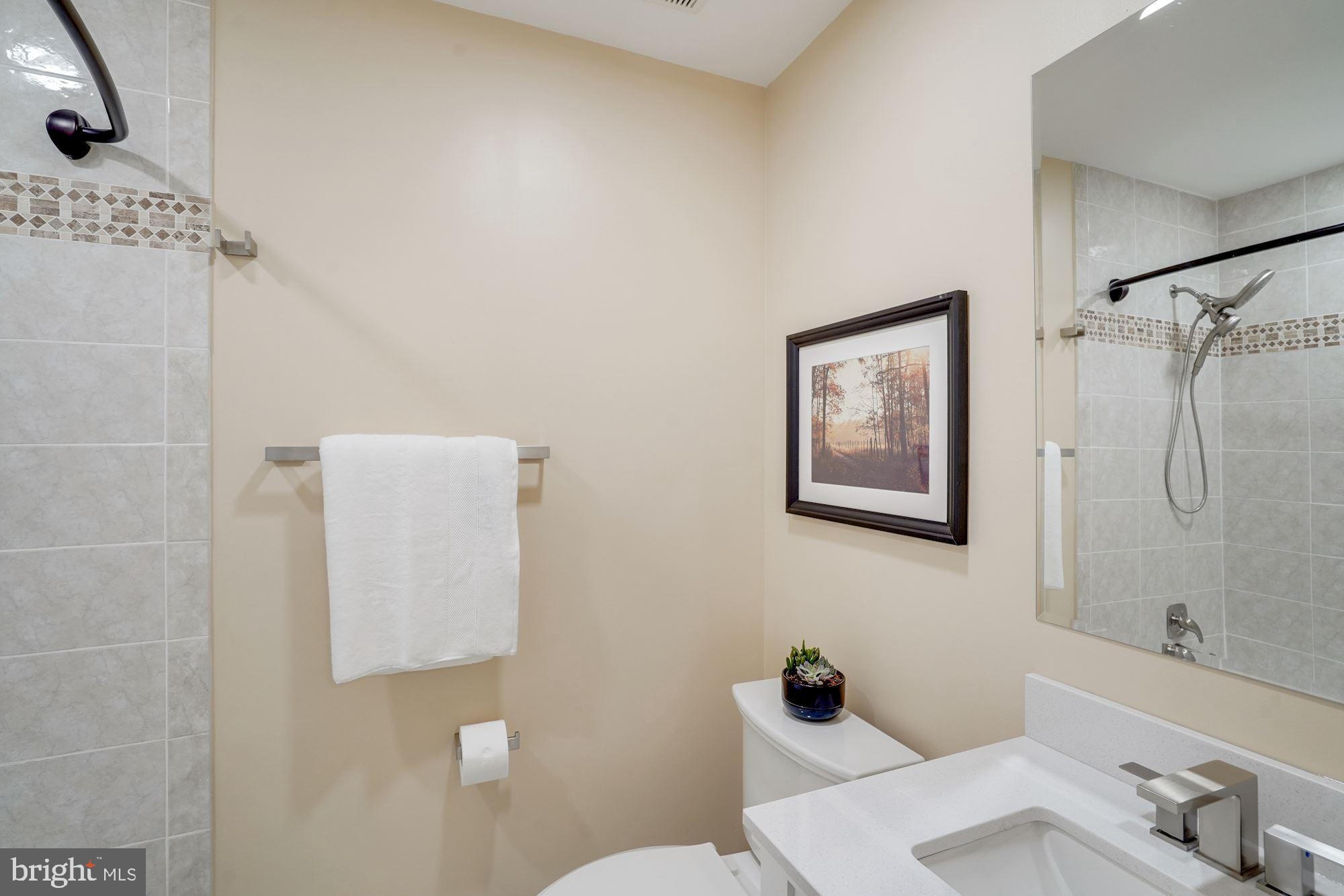 8014 Sleepy View Lane Springfield, VA 22153 - Photo 16 of 35 Updated Hall bathroom.