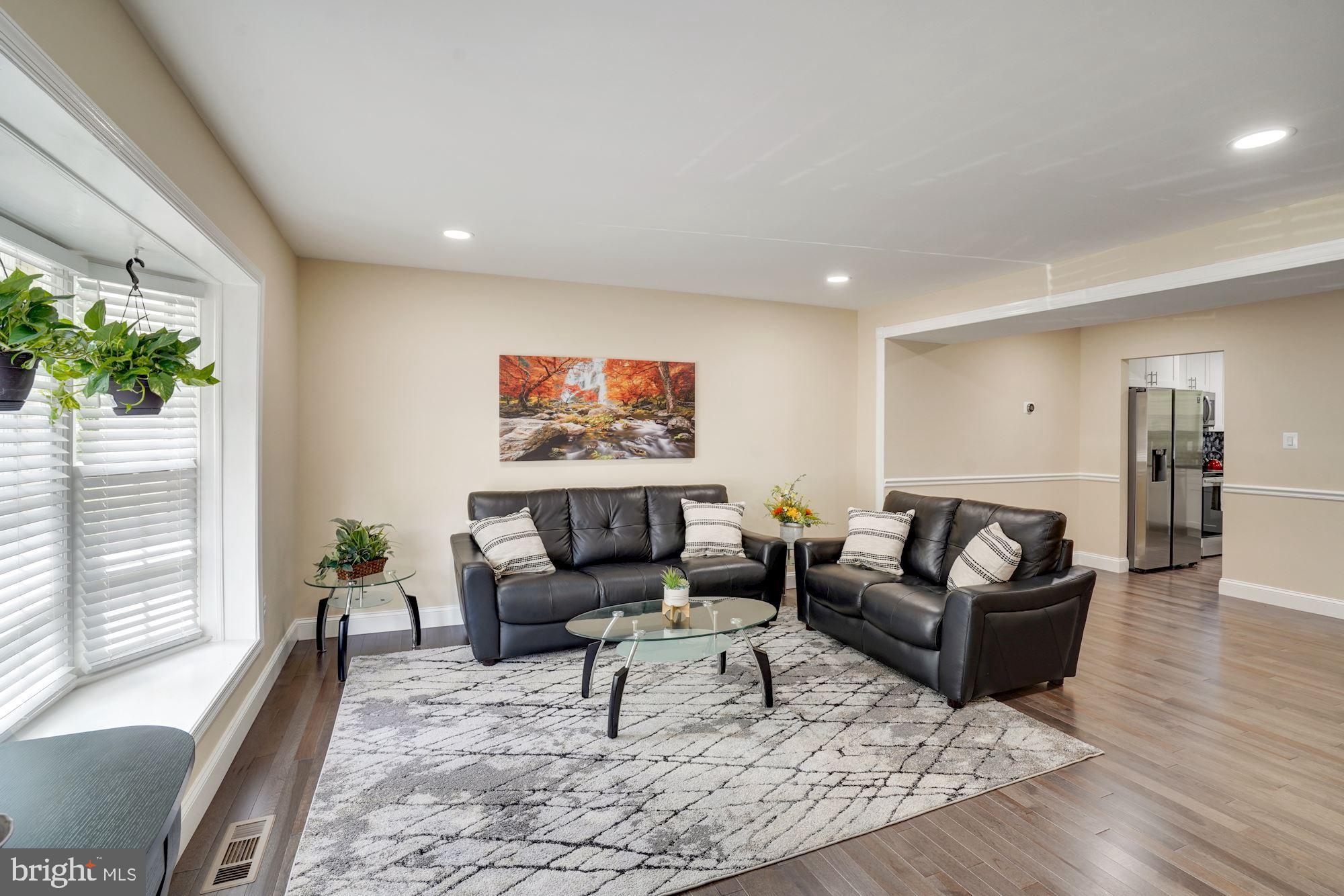 8014 Sleepy View Lane Springfield, VA 22153 - Photo 3 of 35 Bright Living room with lots of natural light.