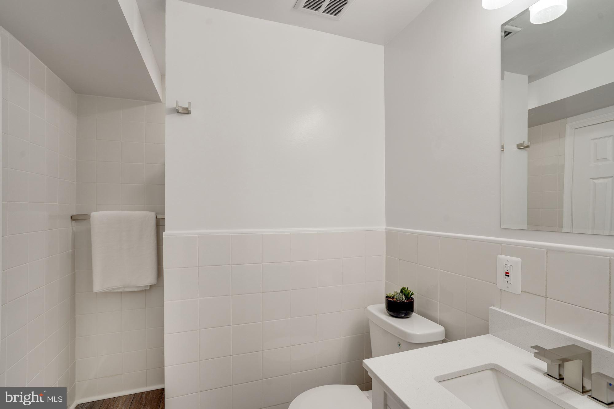 8014 Sleepy View Lane Springfield, VA 22153 - Photo 23 of 35 Updated Full Bathroom in basement.