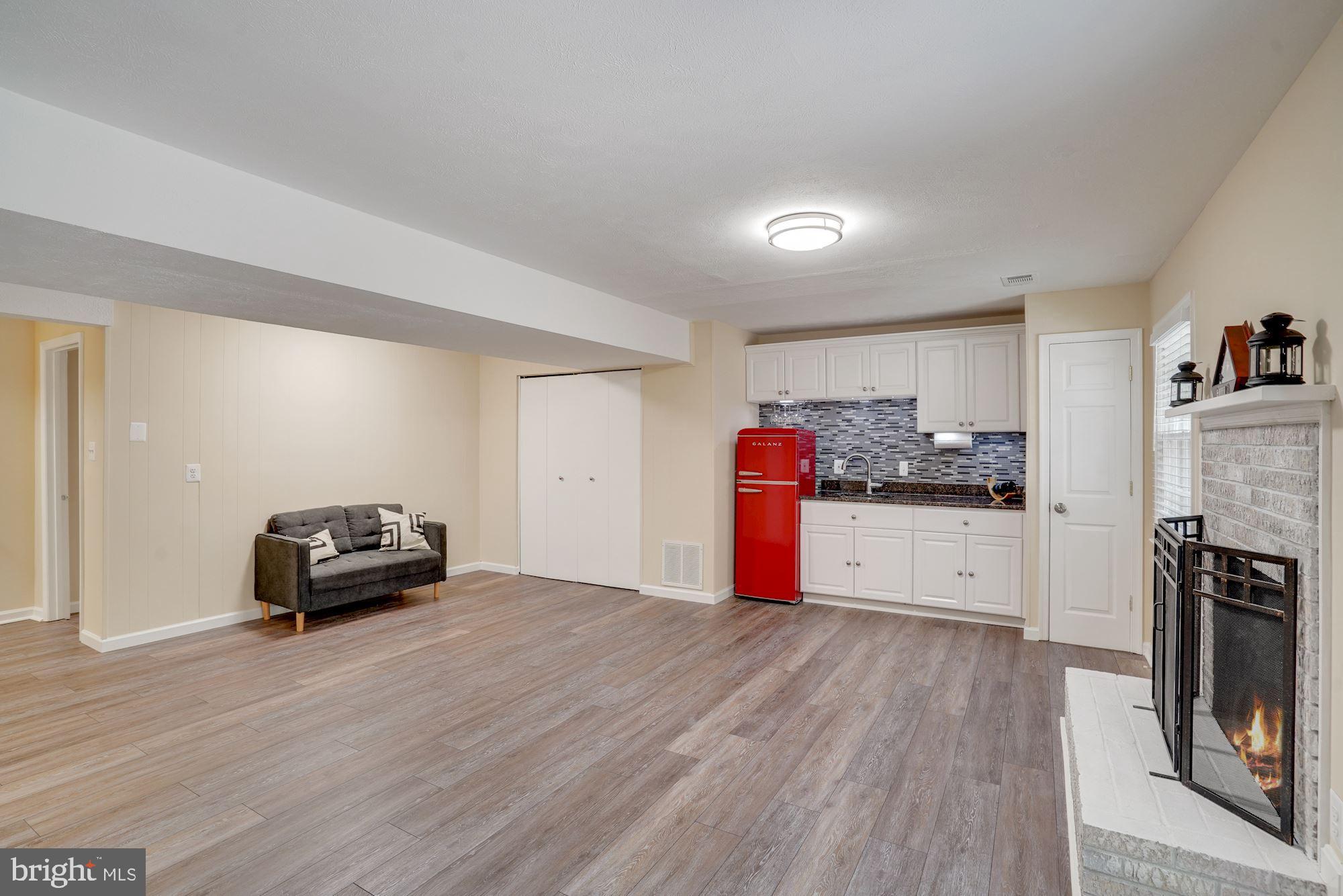 8014 Sleepy View Lane Springfield, VA 22153 - Photo 28 of 35 Kitchenette with refrigerator and sink.