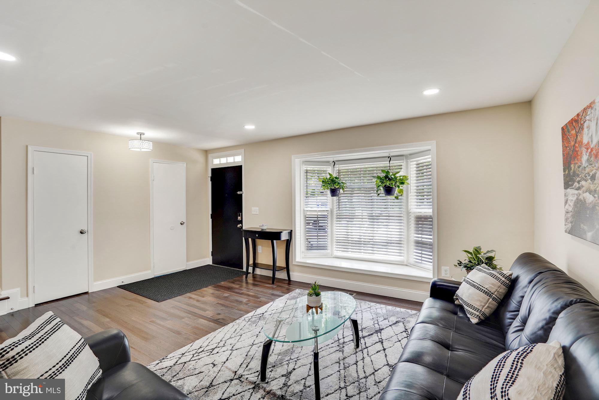 8014 Sleepy View Lane Springfield, VA 22153 - Photo 5 of 35 Bright Living room with recessed lights.